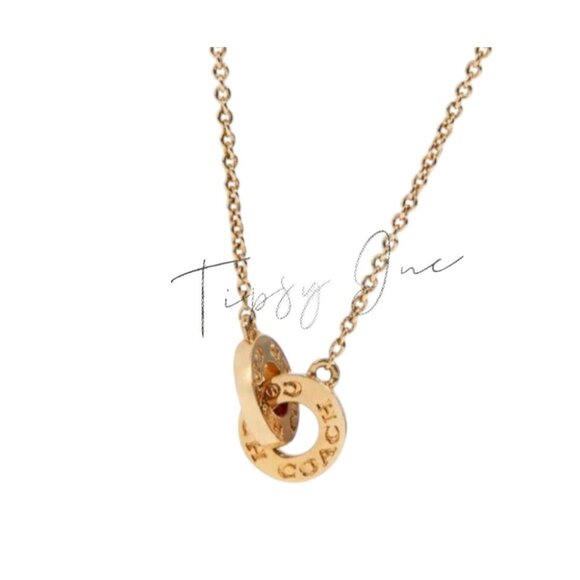 Coach Gold-Tone Interlocking Signature Pendant Necklace - Picture 3 of 5
